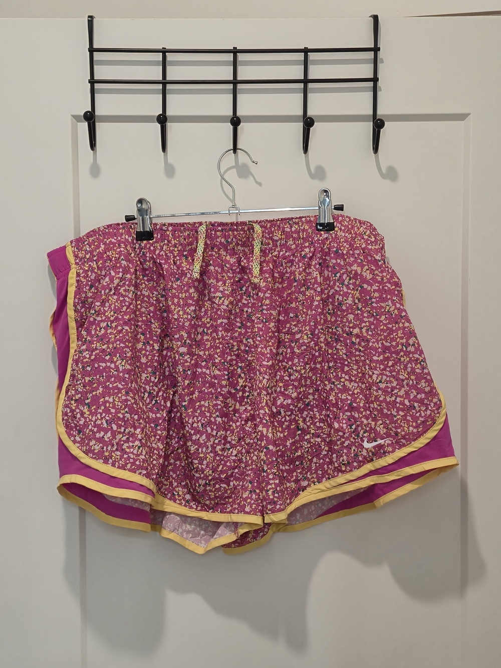 Nike Women’s Pink Floral Athletic Shorts with Yellow Trim